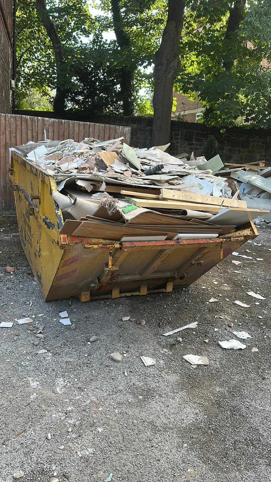 Skip loaded with removed materials during a residential property clearance