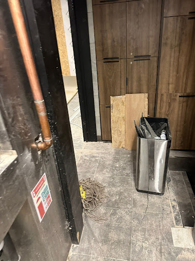 Complete bathroom strip out (tiles and fixtures) and residential basement clearance.