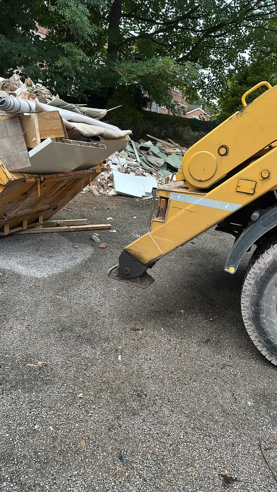 Removed strip out materials being loaded for responsible disposal